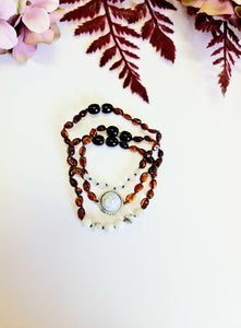 Layered Dark Cognac Bracelets with Marble Spacers.