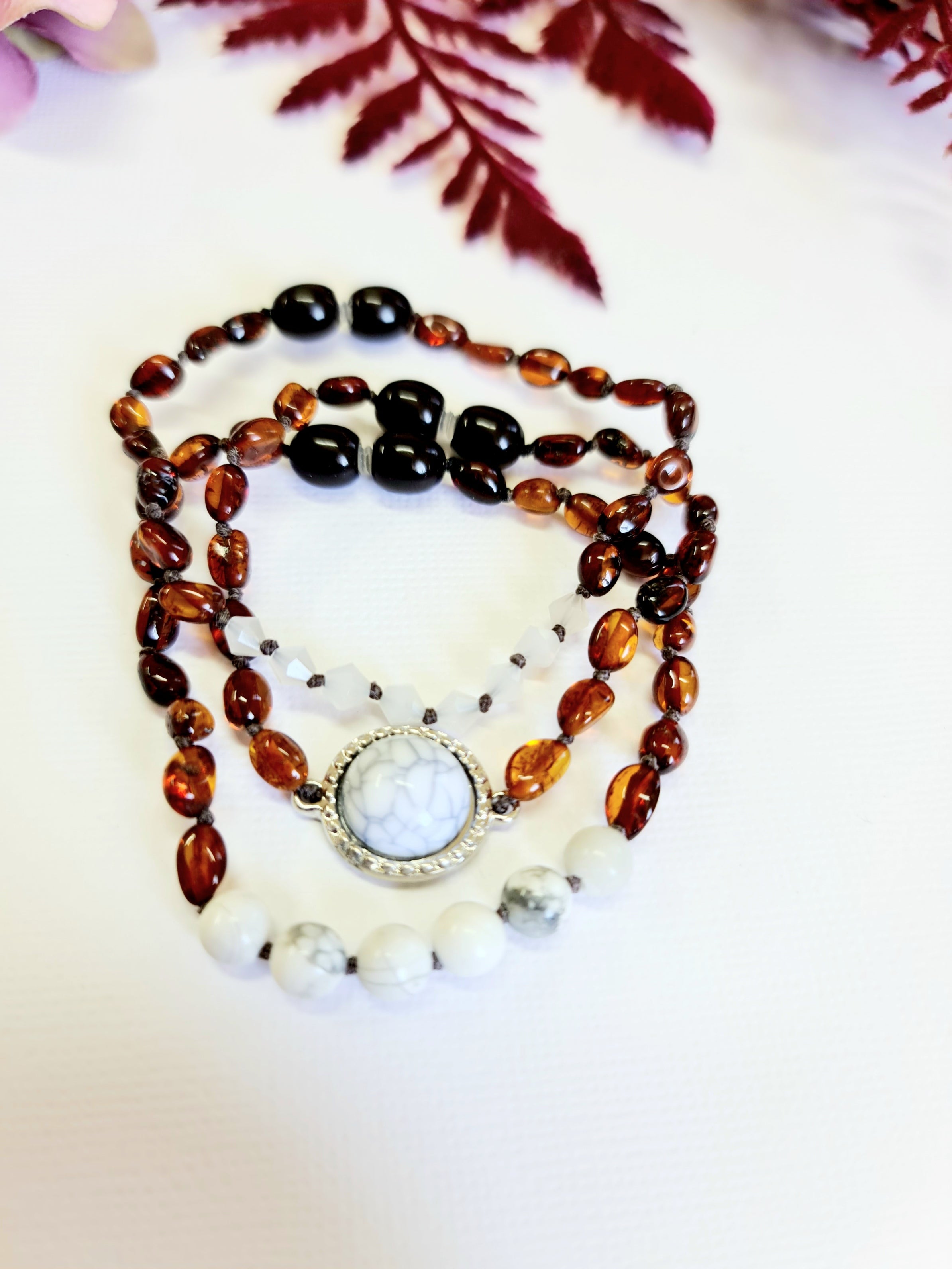 Layered Dark Cognac Bracelets with Marble Spacers.